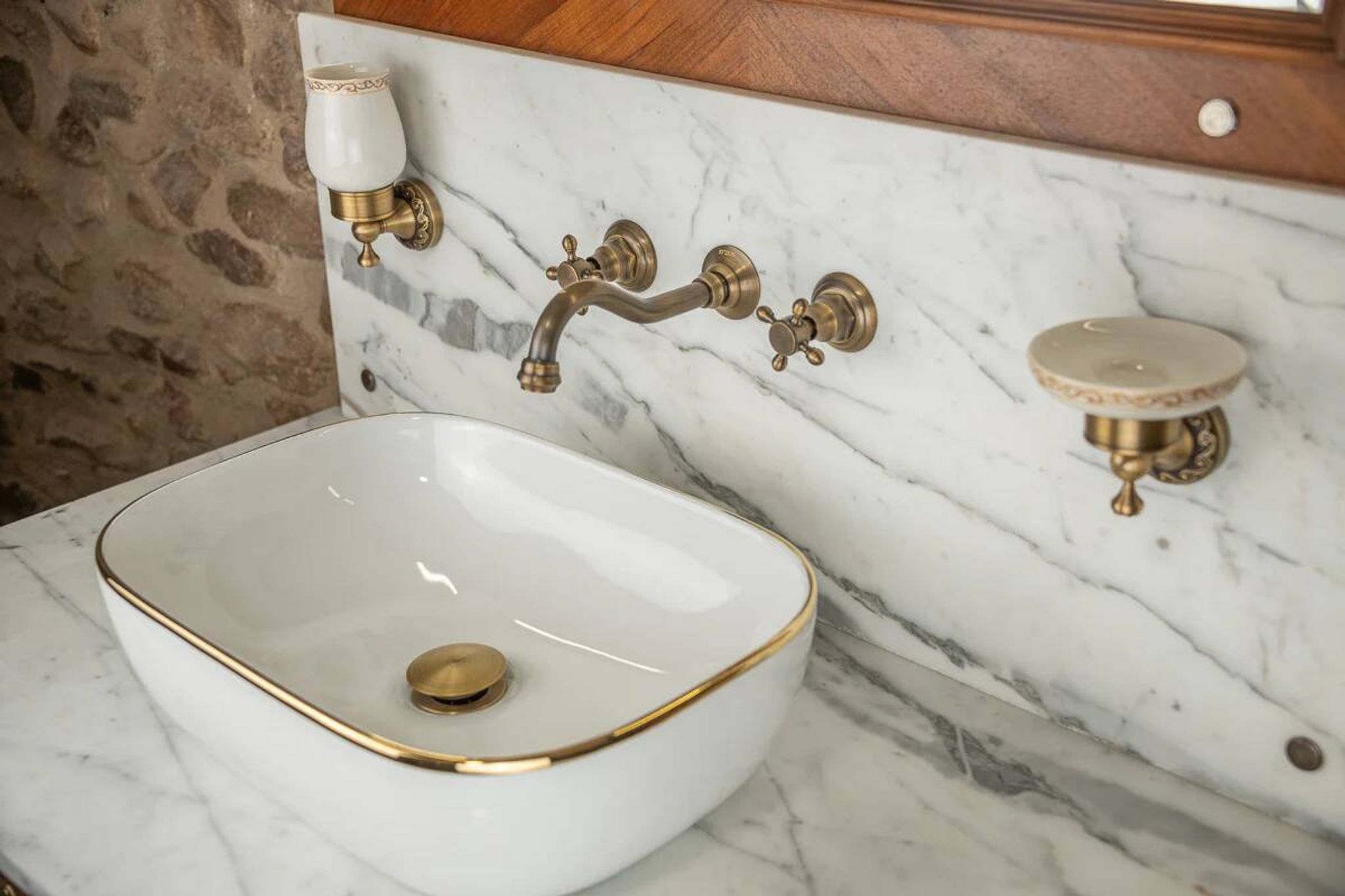 Antique washbasin cabinet from 1928 in wood and marble with illuminating mirror.