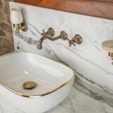 Antique washbasin cabinet from 1928 in wood and marble with a lighted mirror.