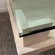 Table basse vintage en travertin et verre