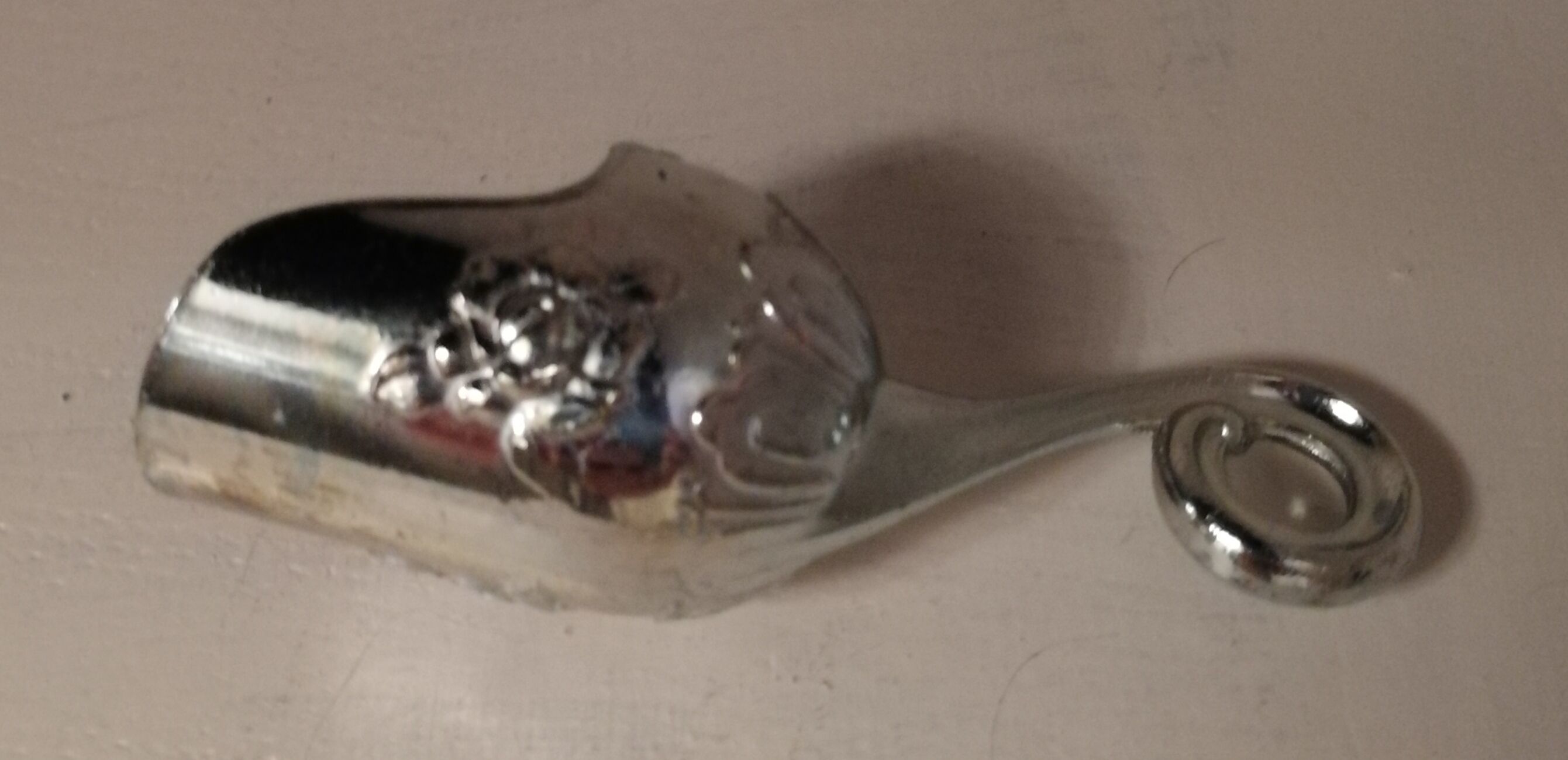 Sugar and sugar shovel in golden silver metal