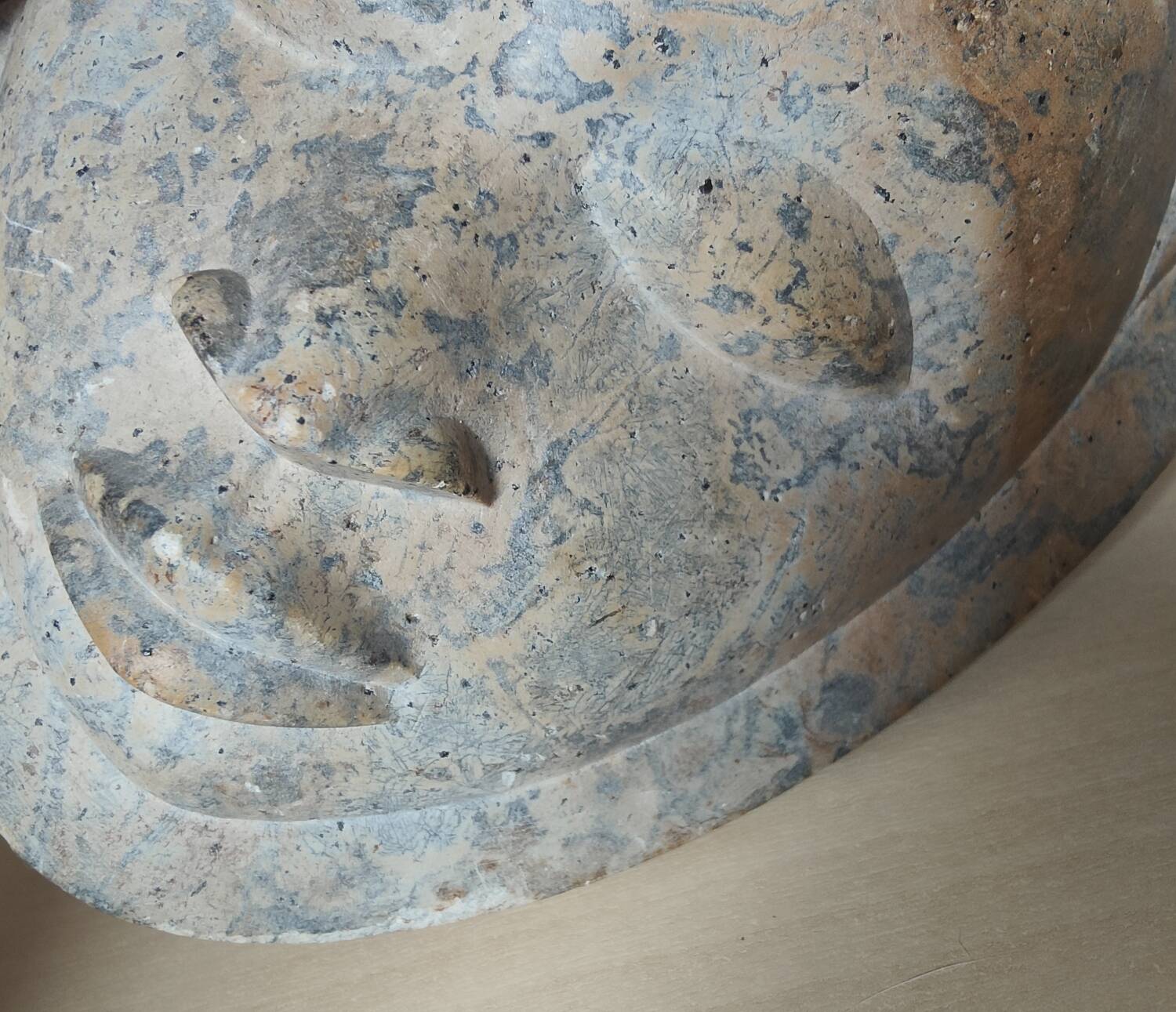 African stone face sculpture