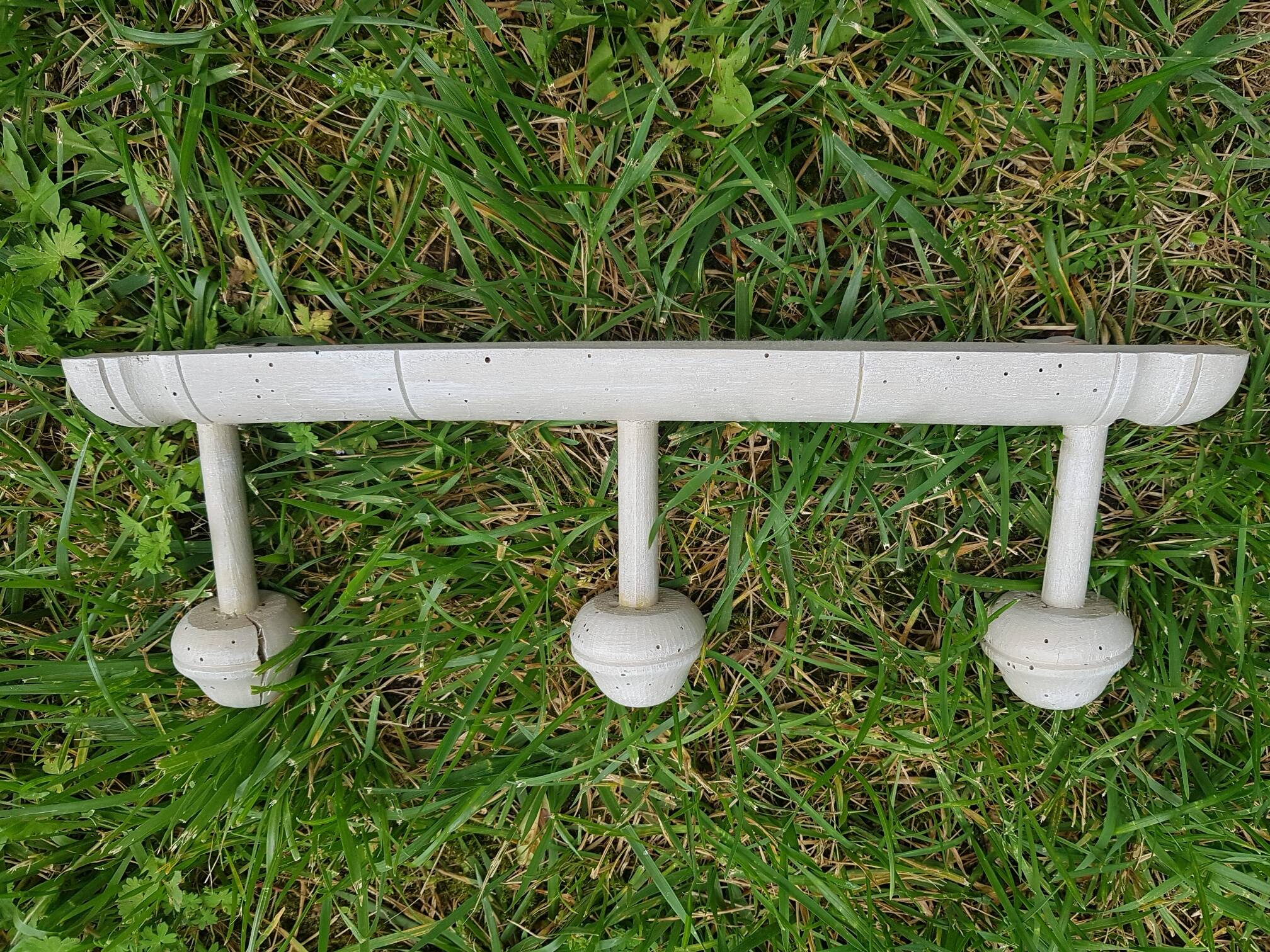 Old wall coat rack with linen patina