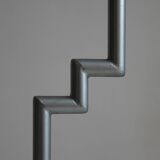 Postmodern round glass  and steel side table, 1980s.