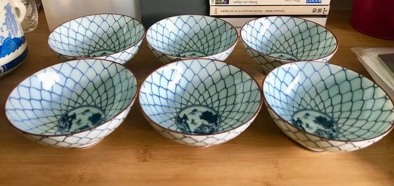 6 white and blue japanese porcelain bowls with mountain decoration