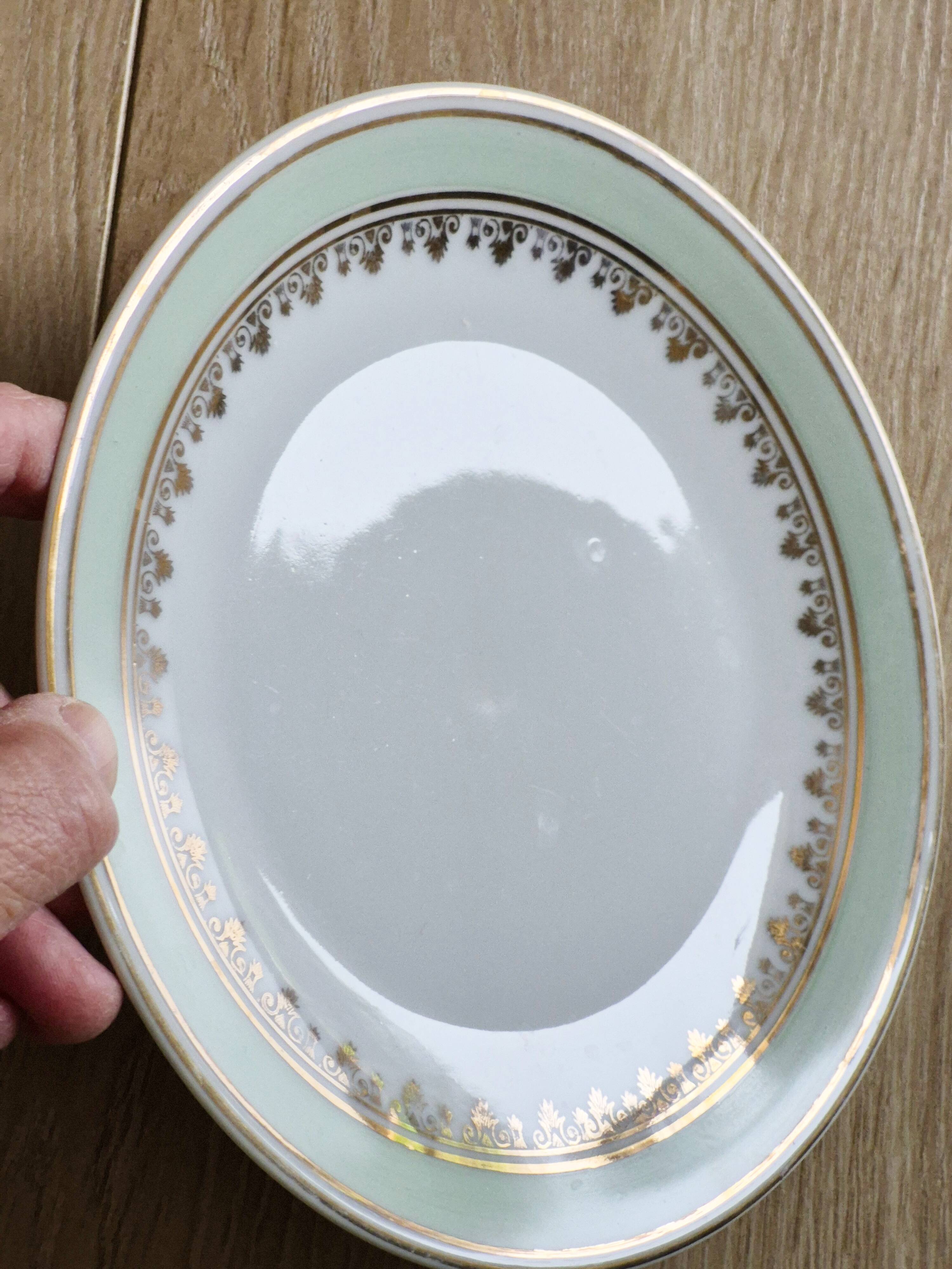 French porcelain dessert plates, green and gold.