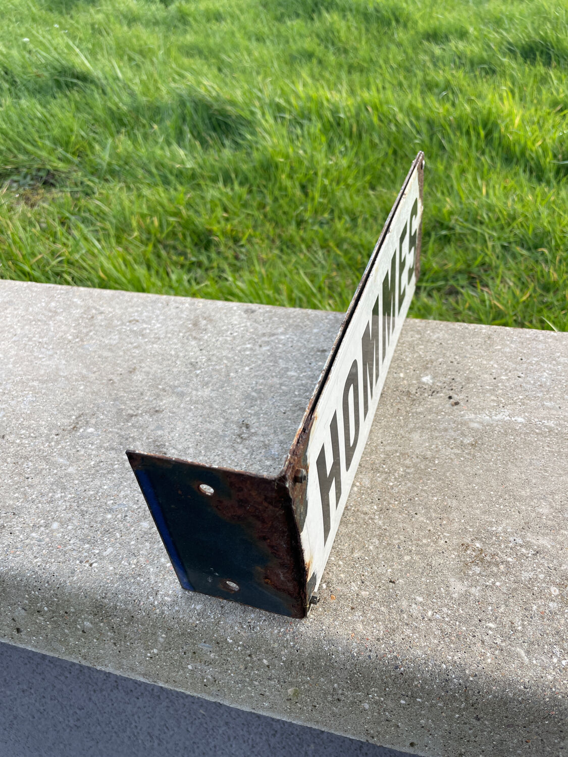 Old double-sided enamelled plate men's toilet stem