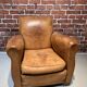 Brown leather armchair