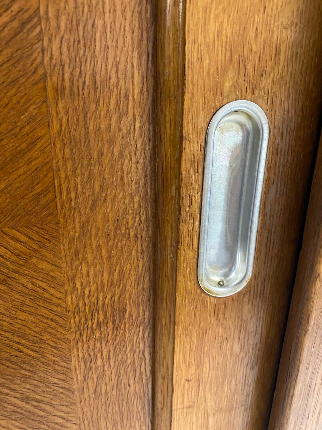 Vintage wardrobe with compass feet, sliding doors