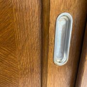 Vintage wardrobe with compass feet, sliding doors
