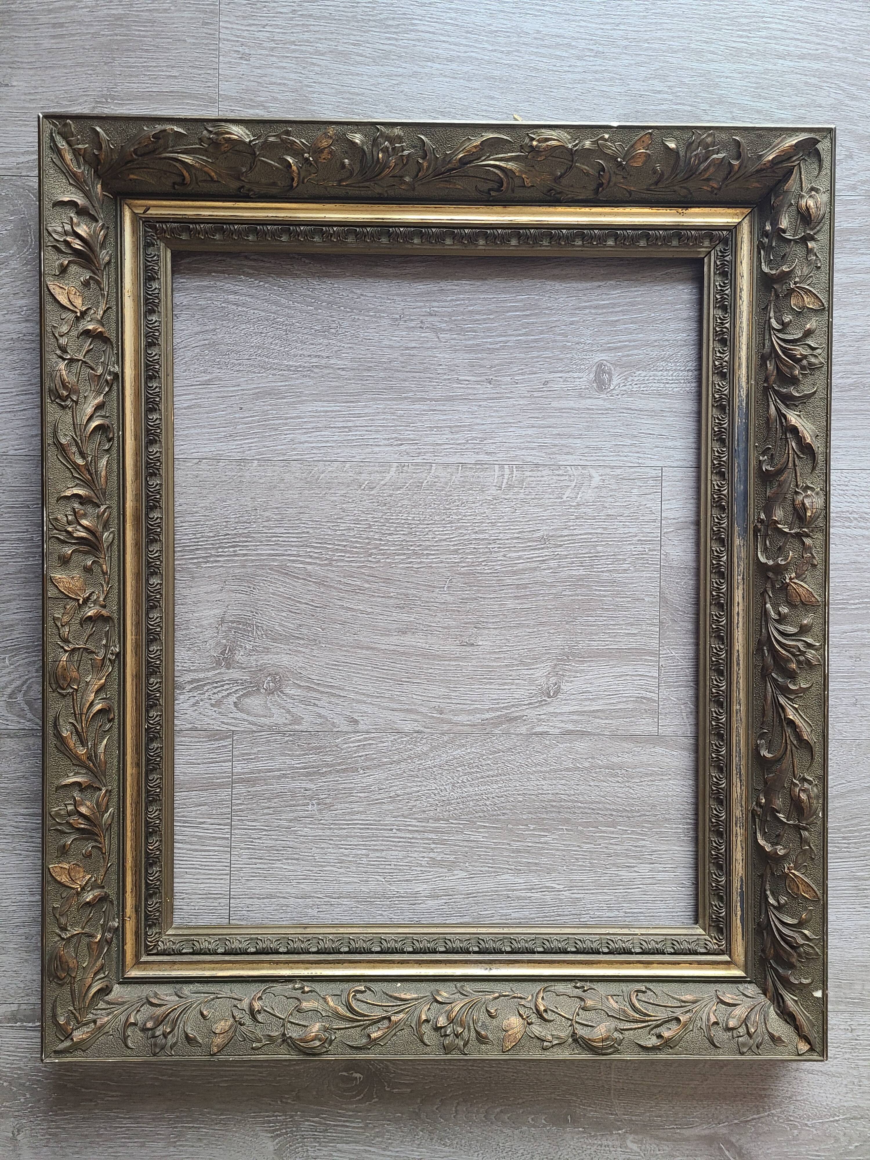 Old 19th century wooden frame with plaster sculpture