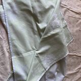Pale green tablecloth