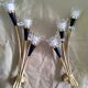 Pair of Lunel wall lights in brass and glass