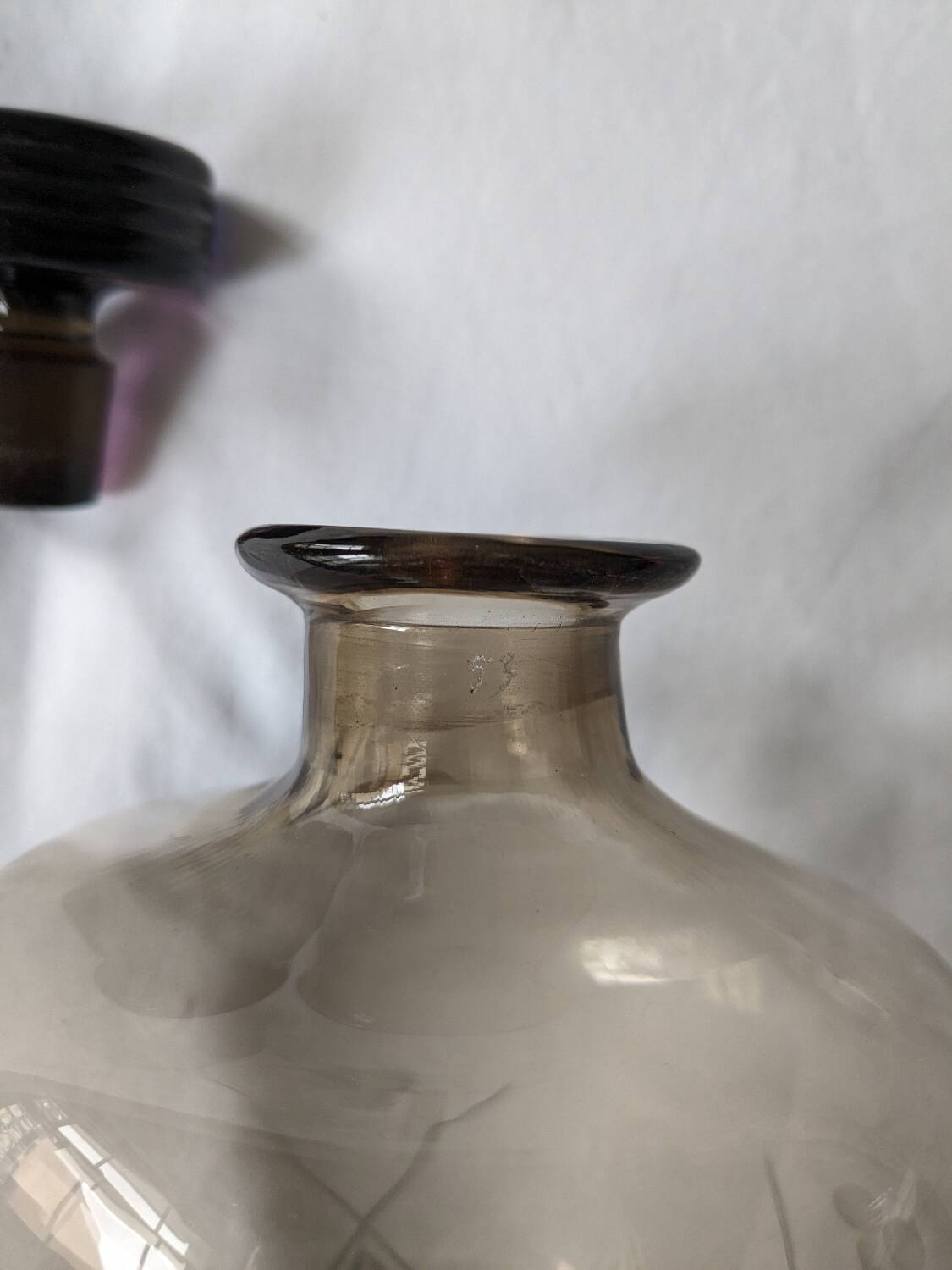 Engraved smoked glass carafe