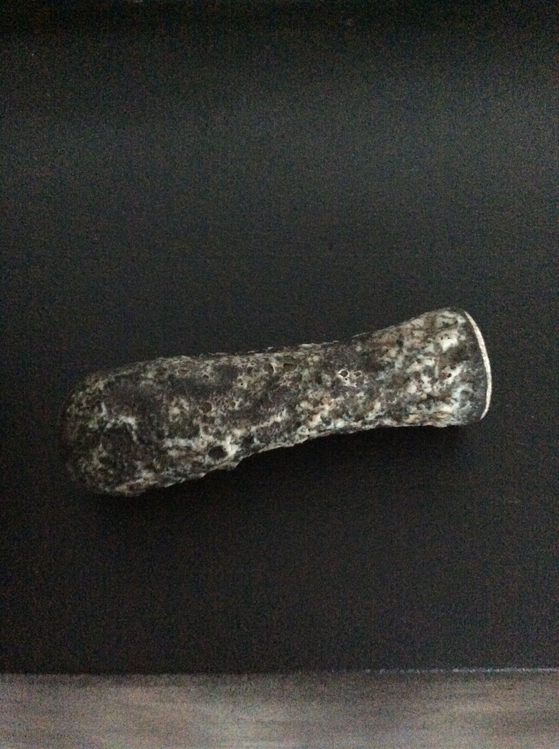 Old mortar and its ceramic pestle Fat Lava