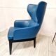 High-back armchair by Rodolfo Dordoni