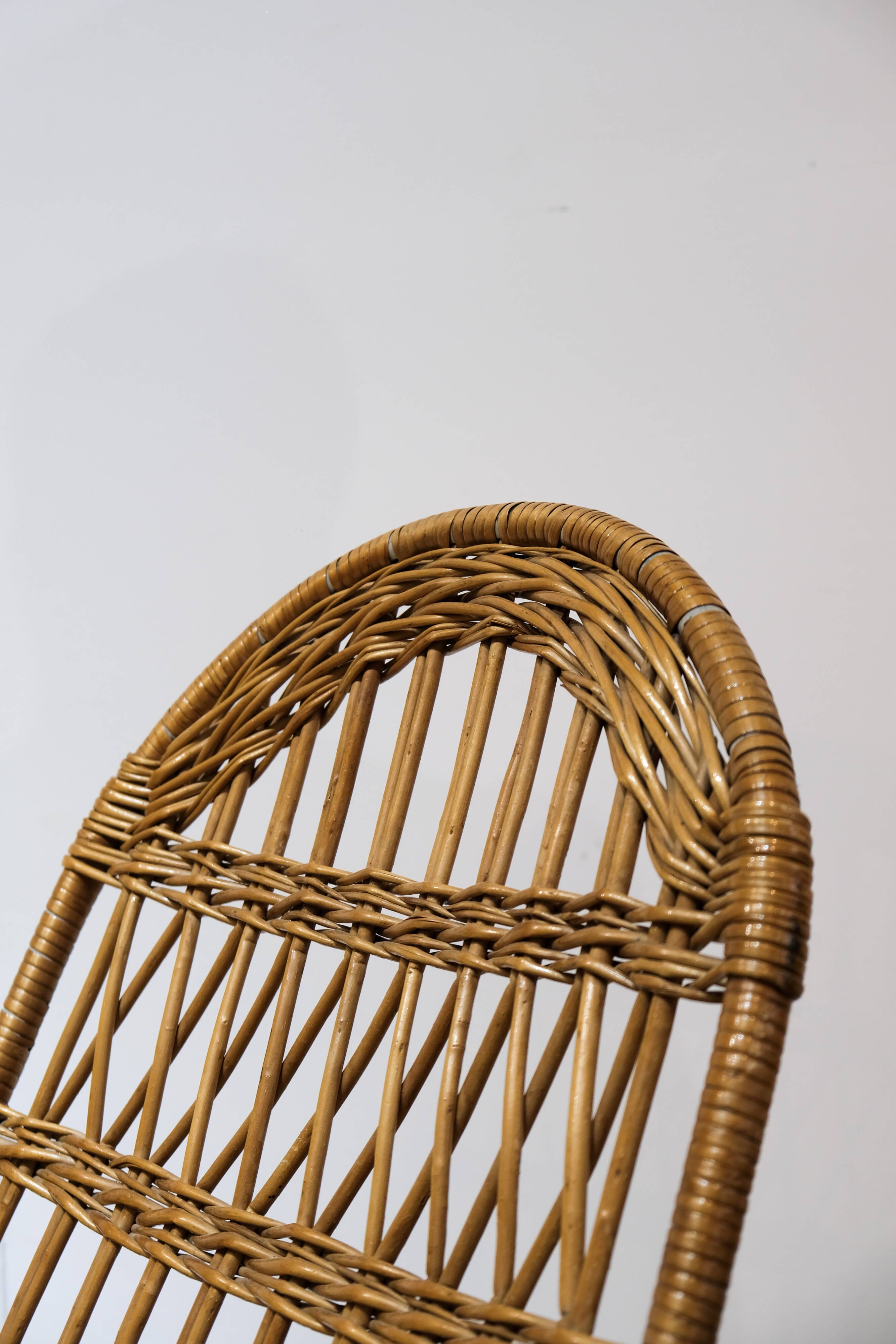Wicker and wood rocking chair