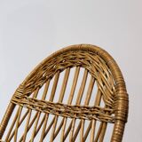 Wicker and wood rocking chair