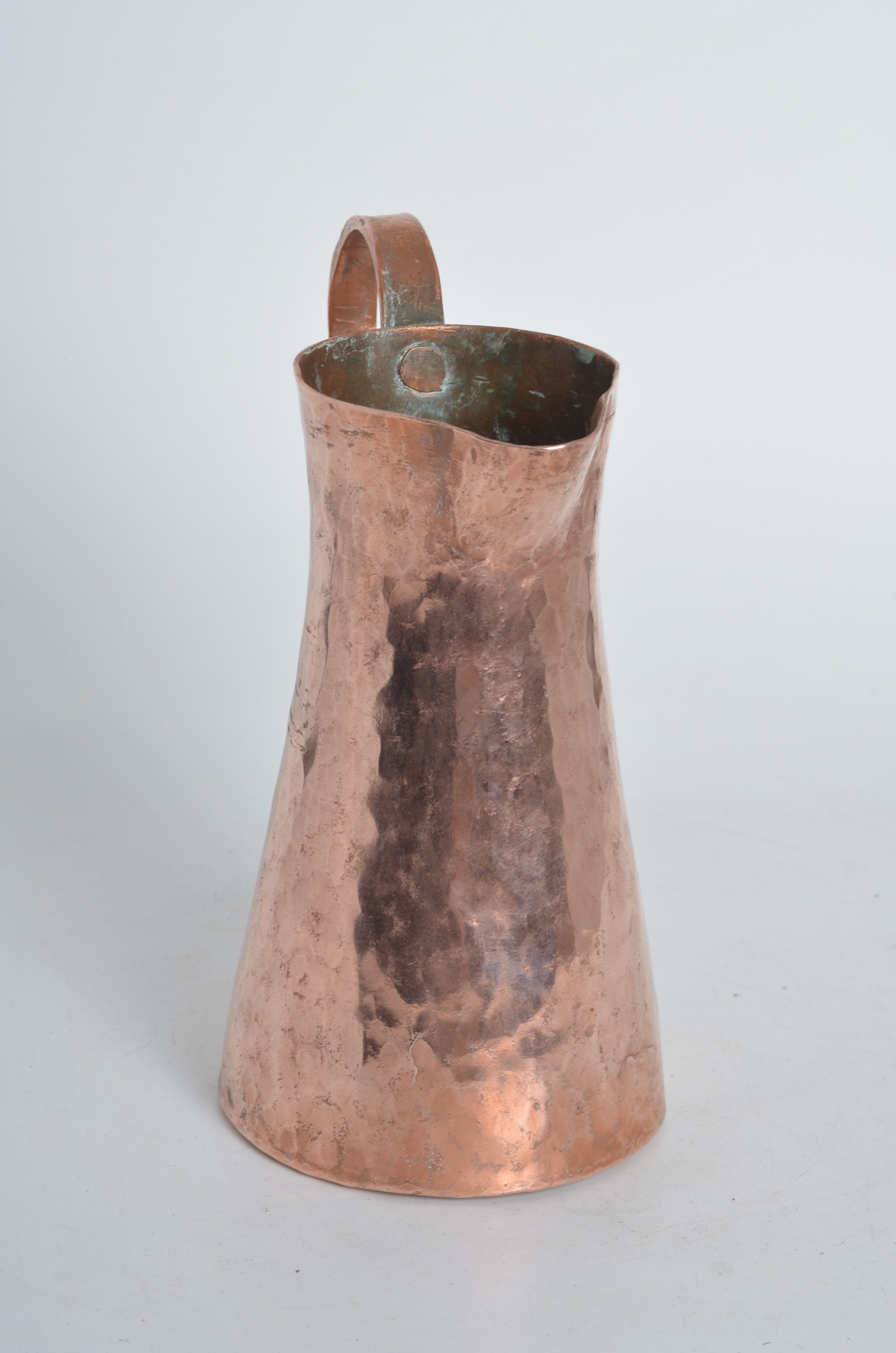 Hammered pink copper pitcher