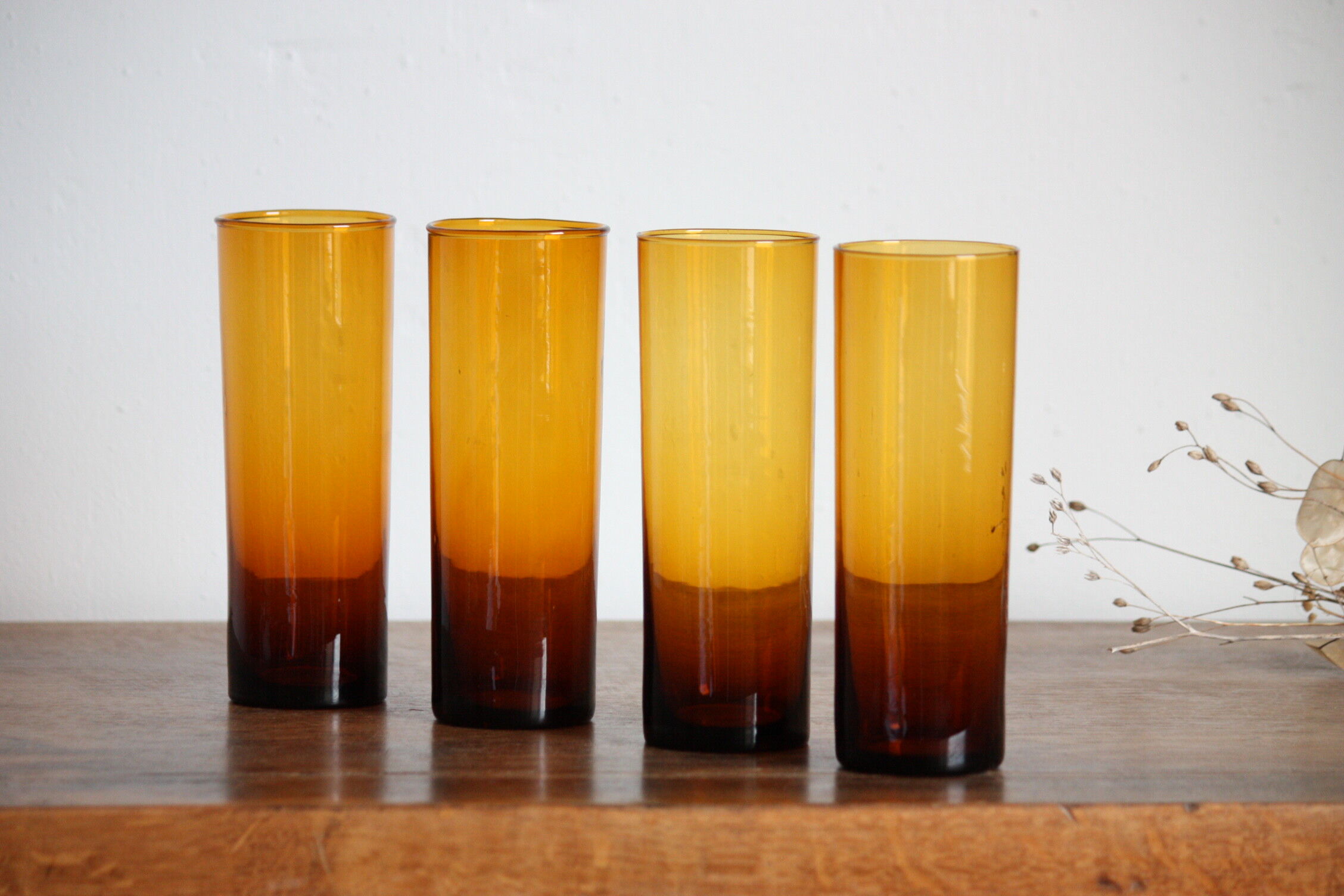 4 amber glasses with orangeade