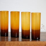 4 amber glasses with orangeade
