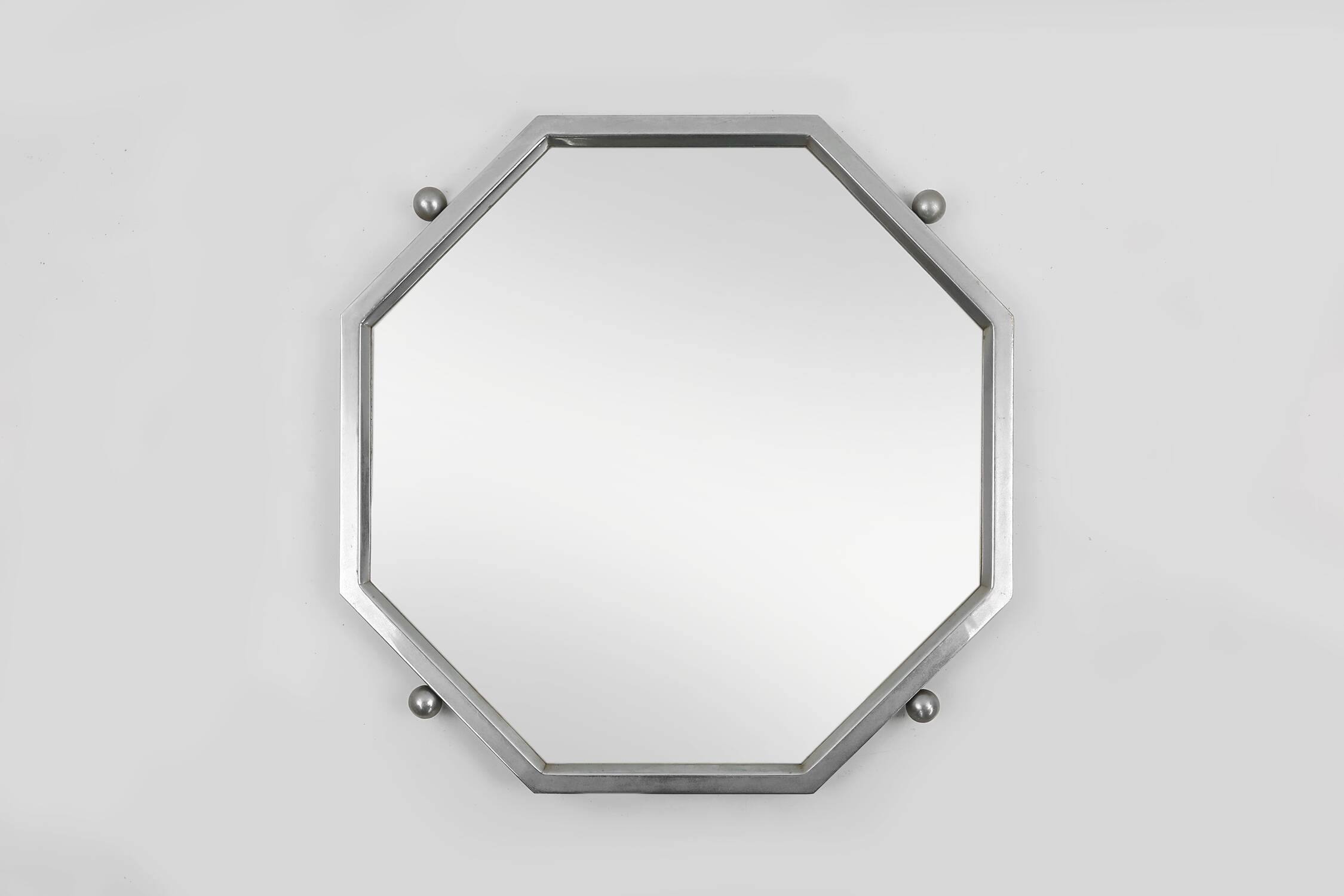 Art Deco octangular mirror in nickeled copper, France ca. 1920