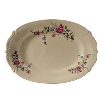 Cream-colored porcelain meat dish with floral decoration