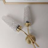 Gold wall light with diamond tips