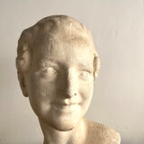 Plaster bust on marble stand