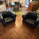 Canapé Chesterfield cuir noir + paire de fauteuils