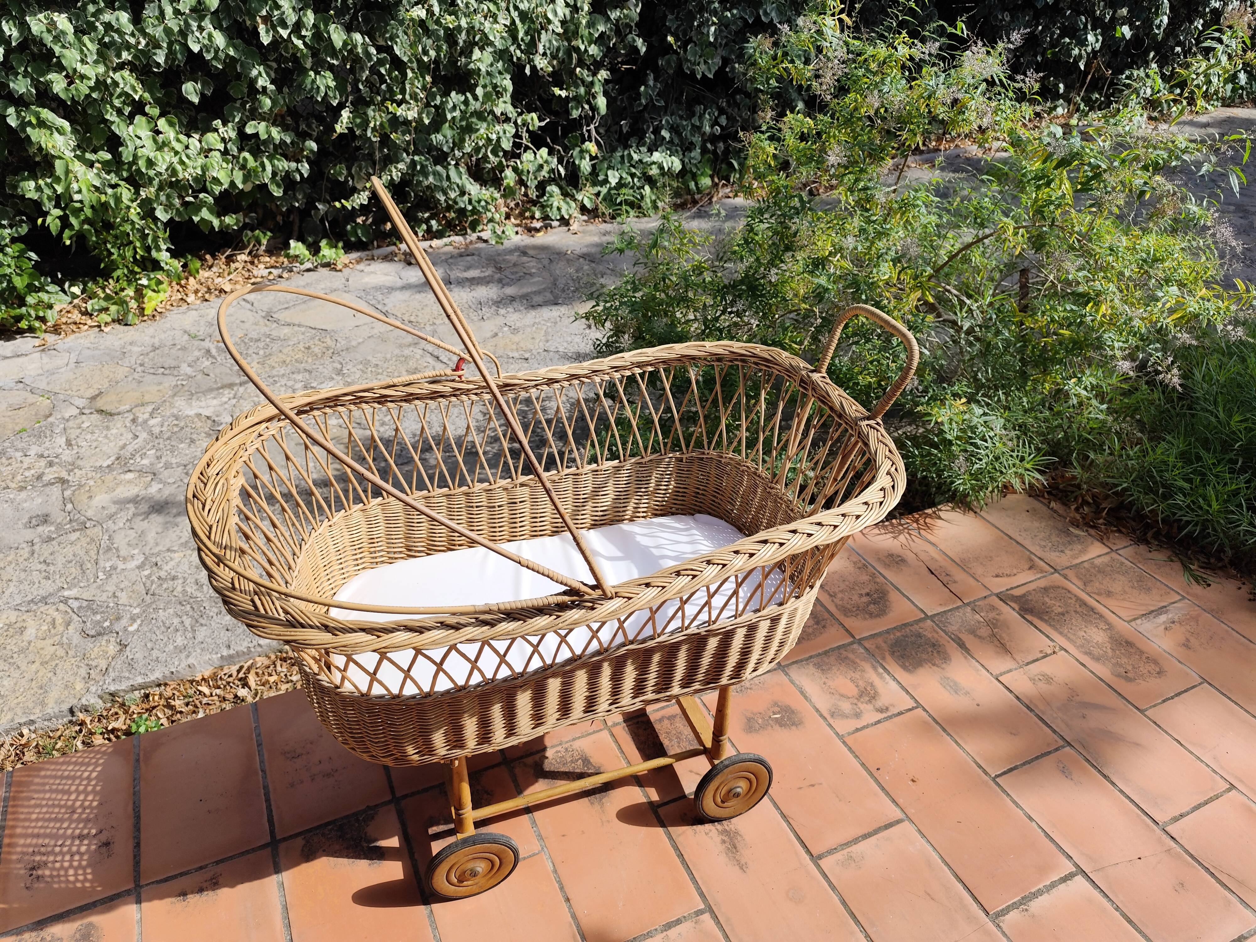 Vintage rattan Alsatian doll cradle bassinet