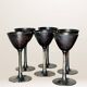 Set of six hammered metal goblets.