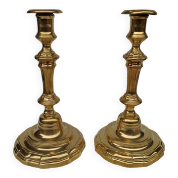 Pair of solid brass candlesticks, early 18th century.