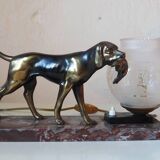 French Art Deco hunting dog on a marble base with a switched lamp.