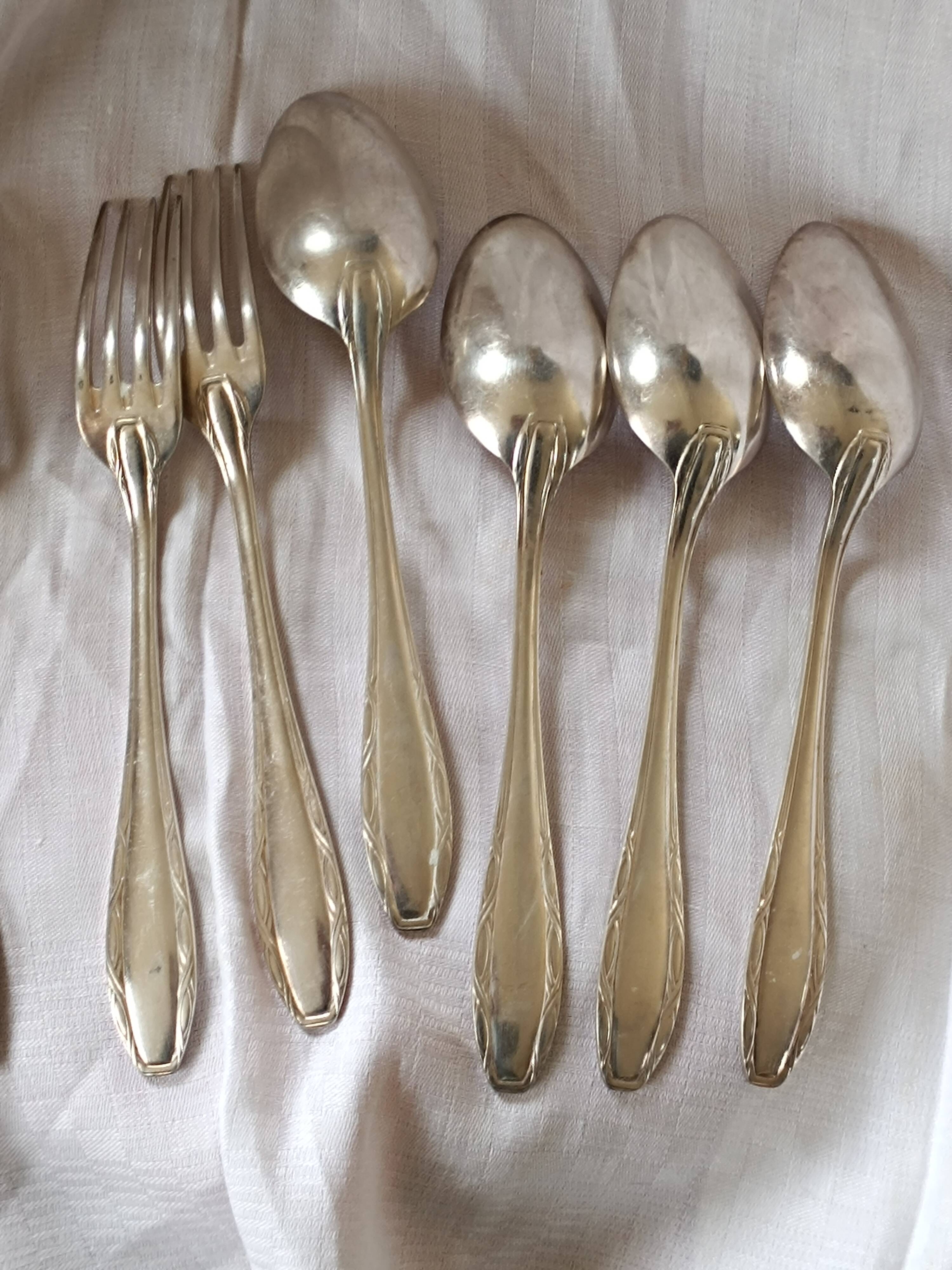 7 silver metal cutlery from the 60s.