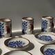 Set of 4 small cups and saucers with Asian blue landscape decor
