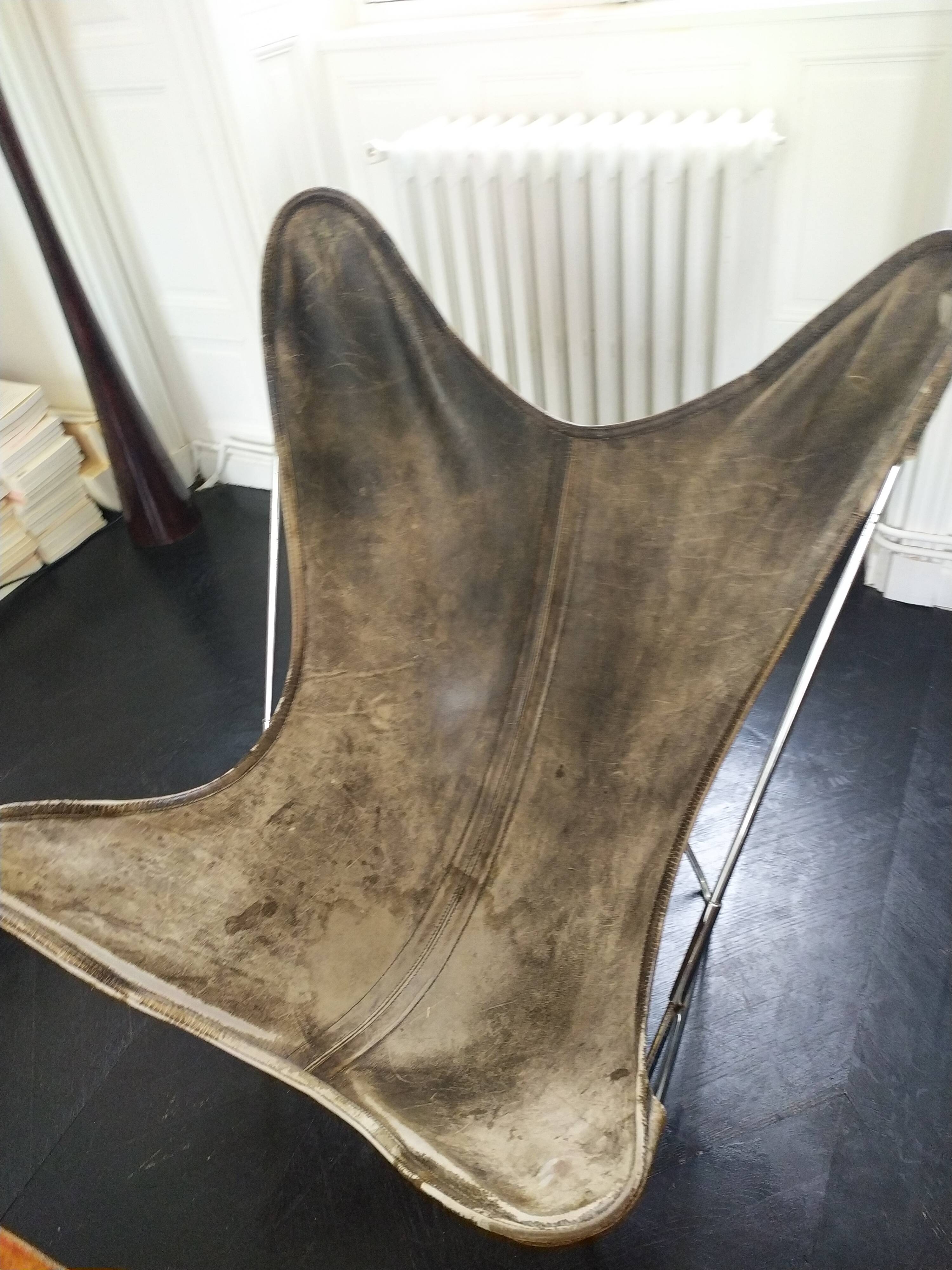 AA Butterfly leather armchairs