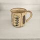 Set of 4 ceramic mugs, glazed stoneware, assorted vintage designs.