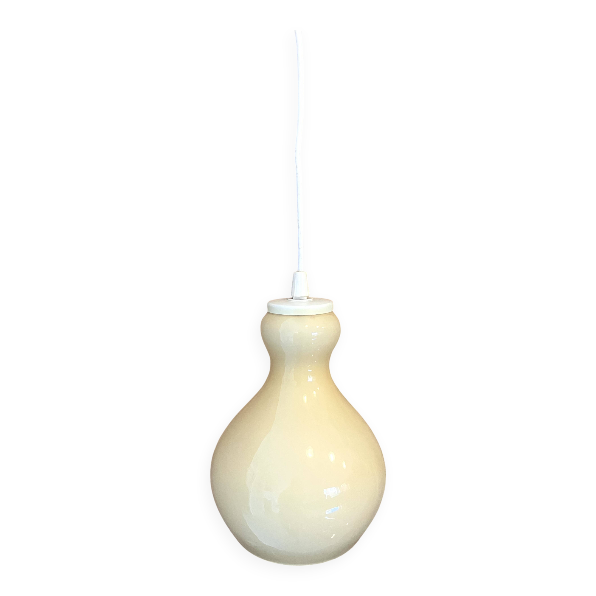 Suspension in vintage mid-century yellow vanilla opaline.