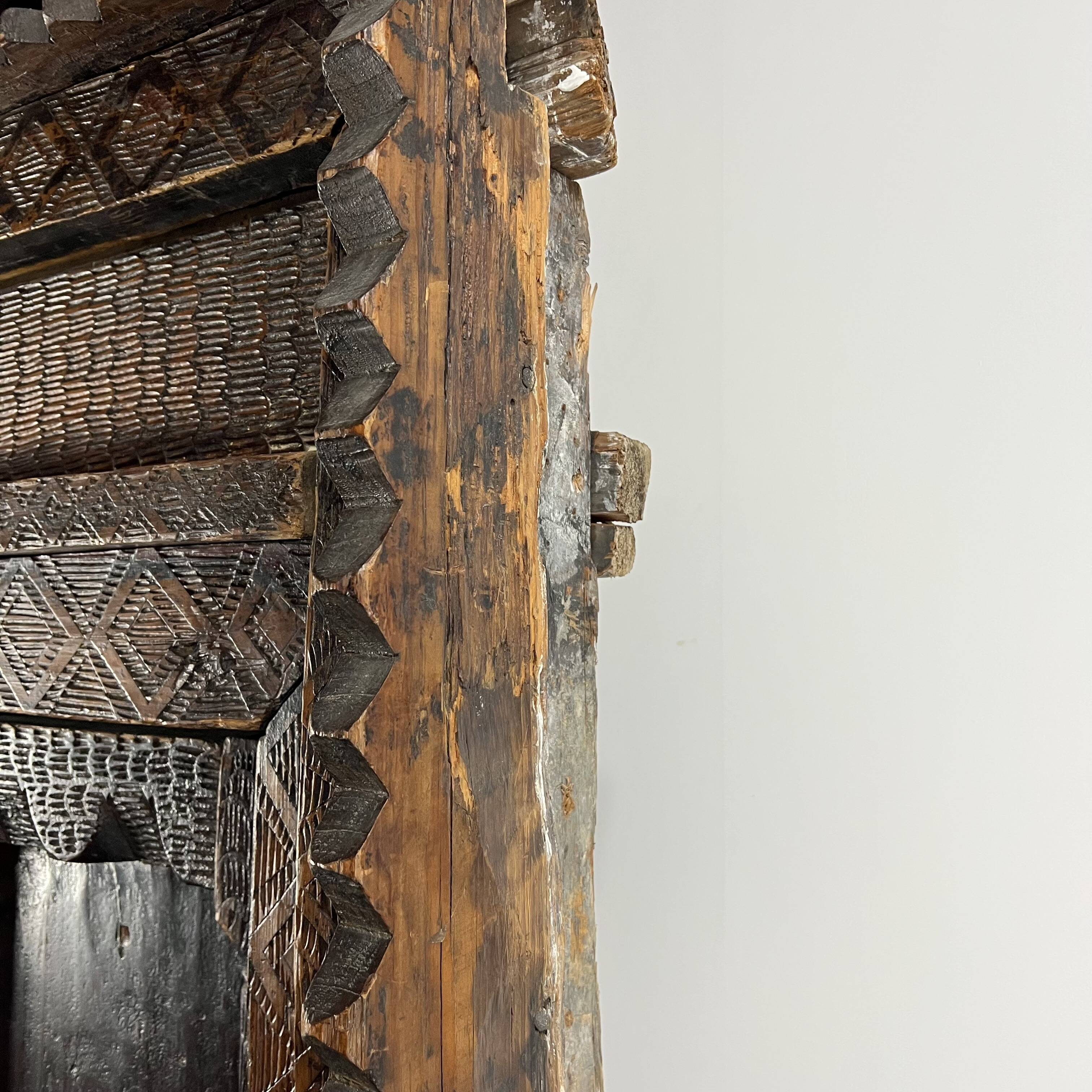 Afghan door in carved wood from the late 19th century with Palace Temple framing.