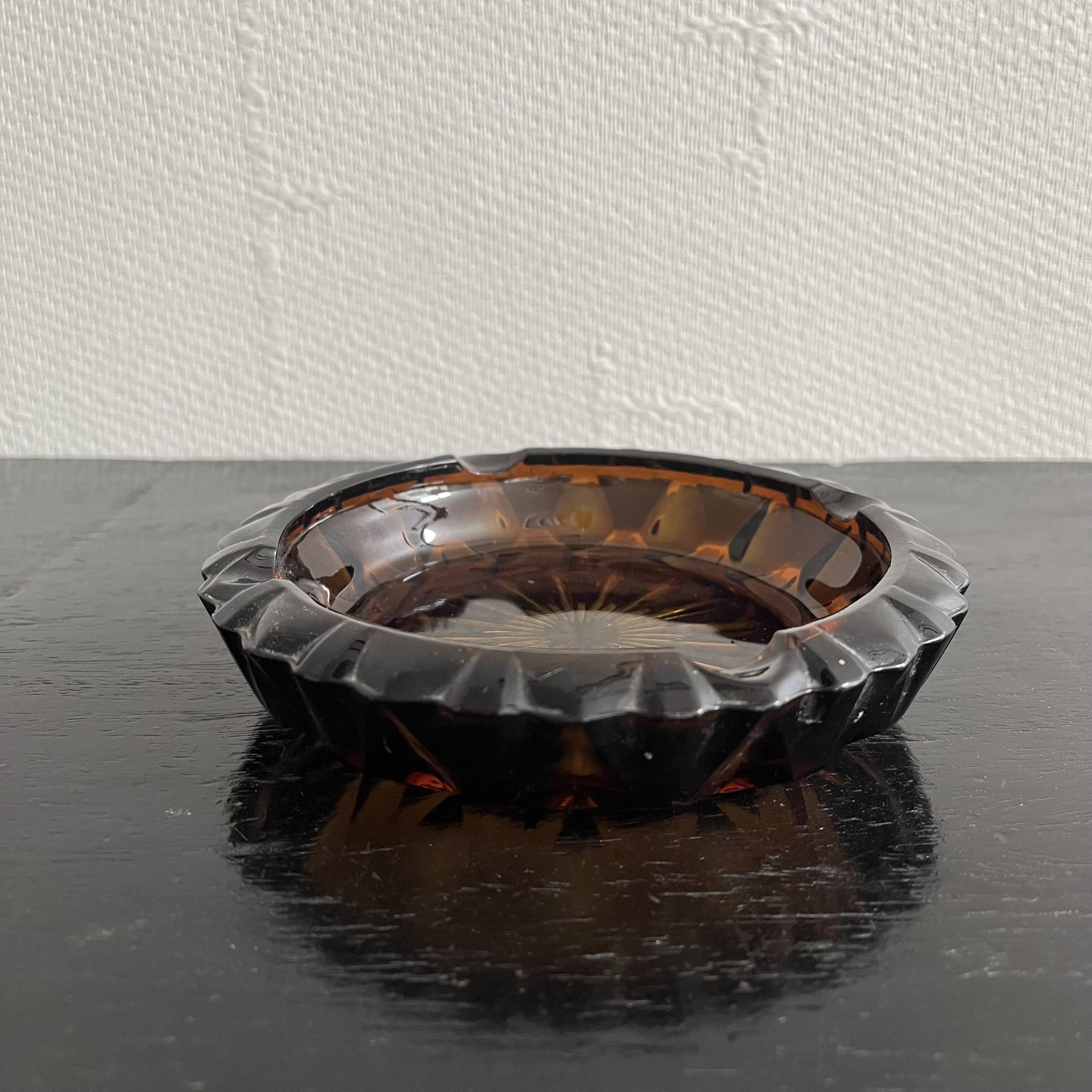 Amber glass ashtray