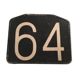 Plaque ancienne de ligne de bus en bakélite n° 64