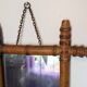 Antique bamboo mirror with pitted glass 40x34 cm