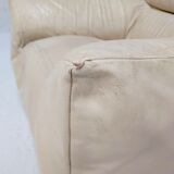 Leather armchair and cream-coloured foam, France , circa 1970