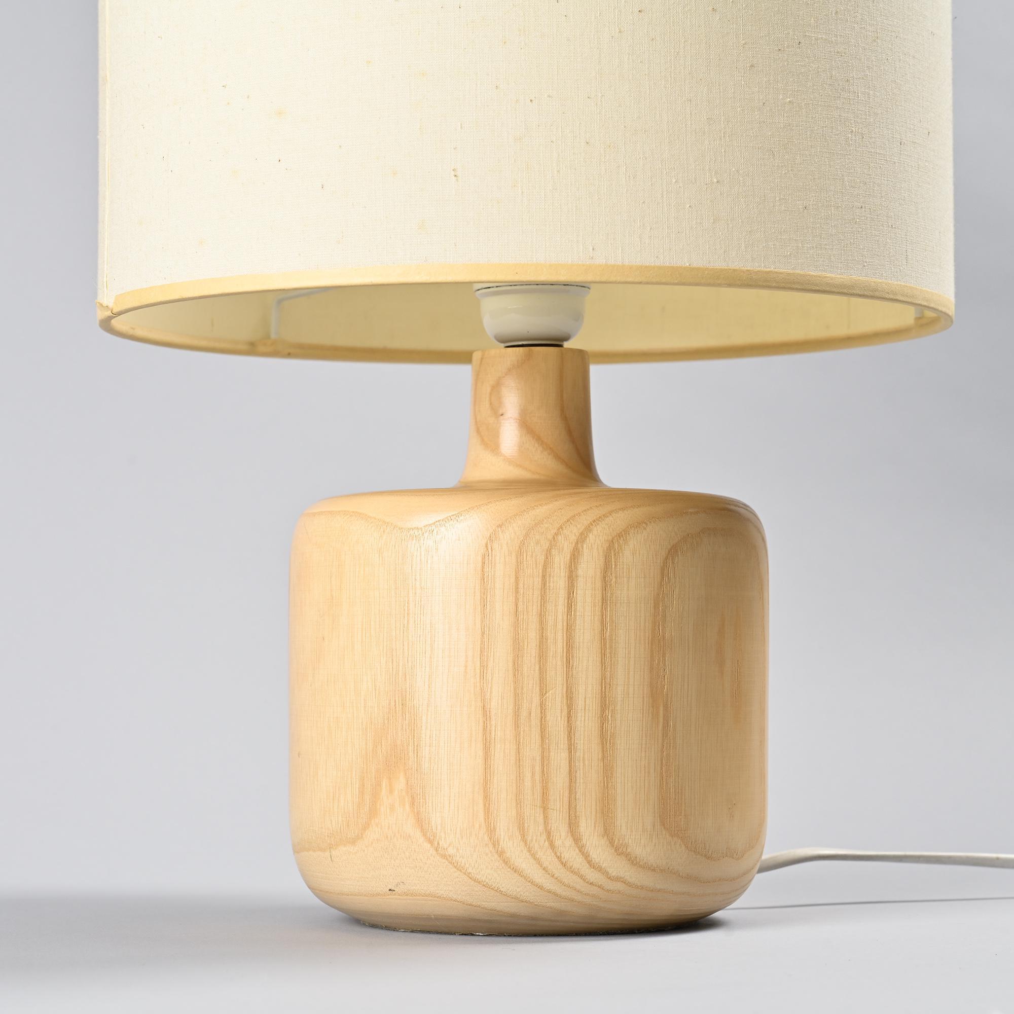 Table lamp in solid elm, France, circa 1970.