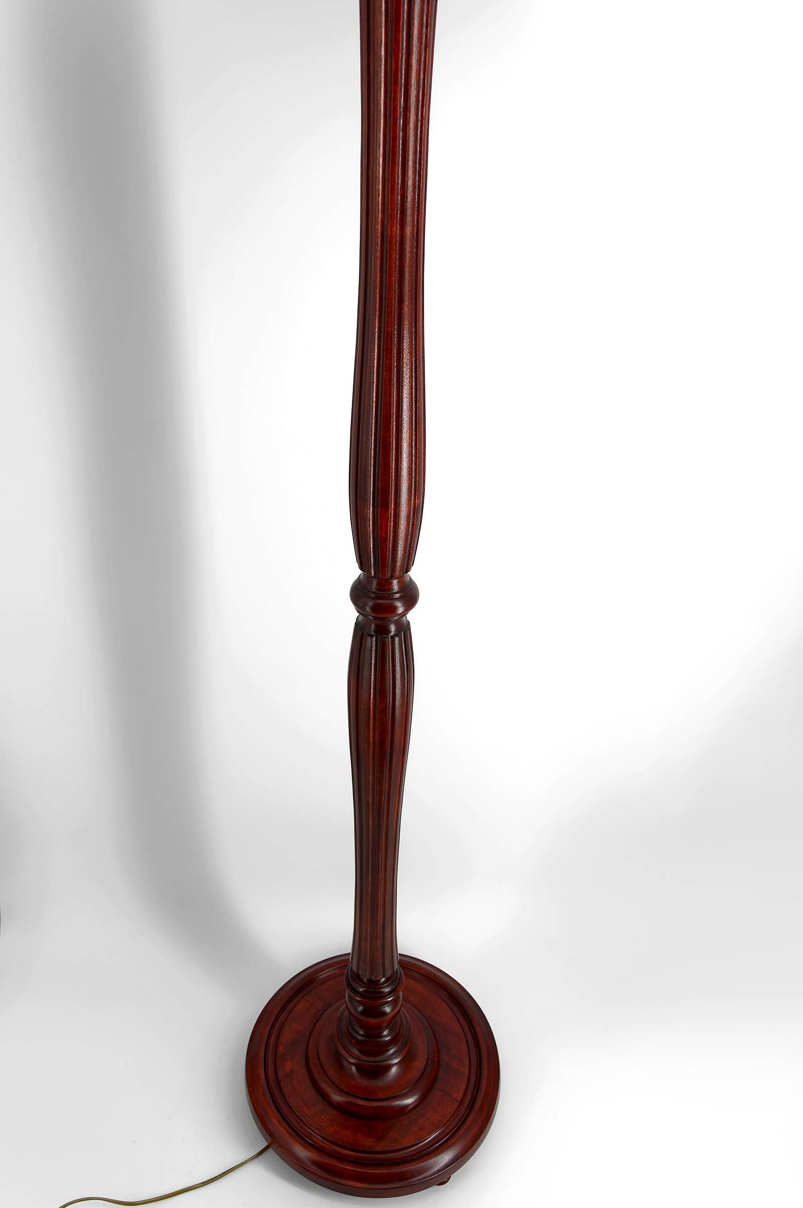 Art Deco floor lamp in carved walnut, stained glass shade, France, c. 1920