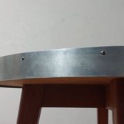 Vintage metal and teak side table from the 1950s.