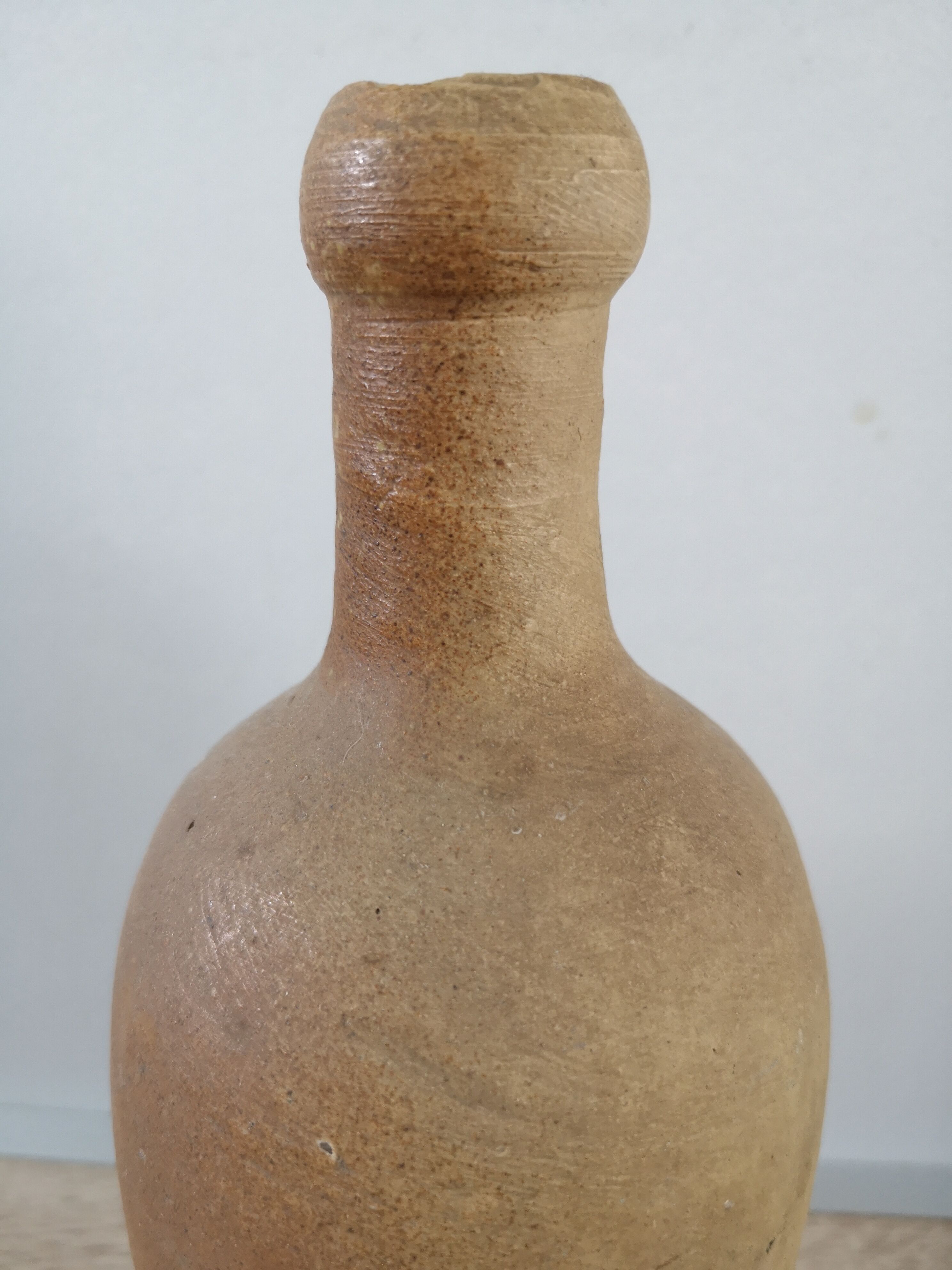 Old sandstone bottle