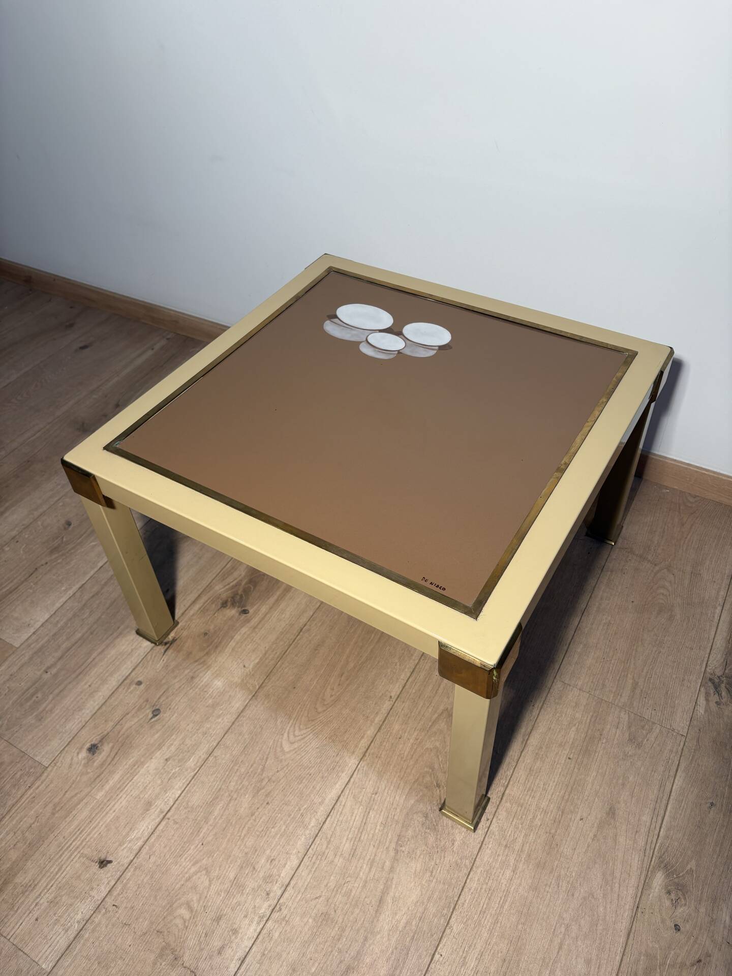 Metal and brass coffee table in ceramic by Nisco.