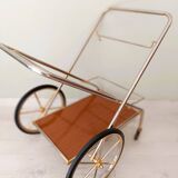 Rolling trolley in gold metal