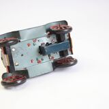 Vintage tin car with pull lever